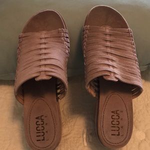 Platform type Sandals. Soft suede material.